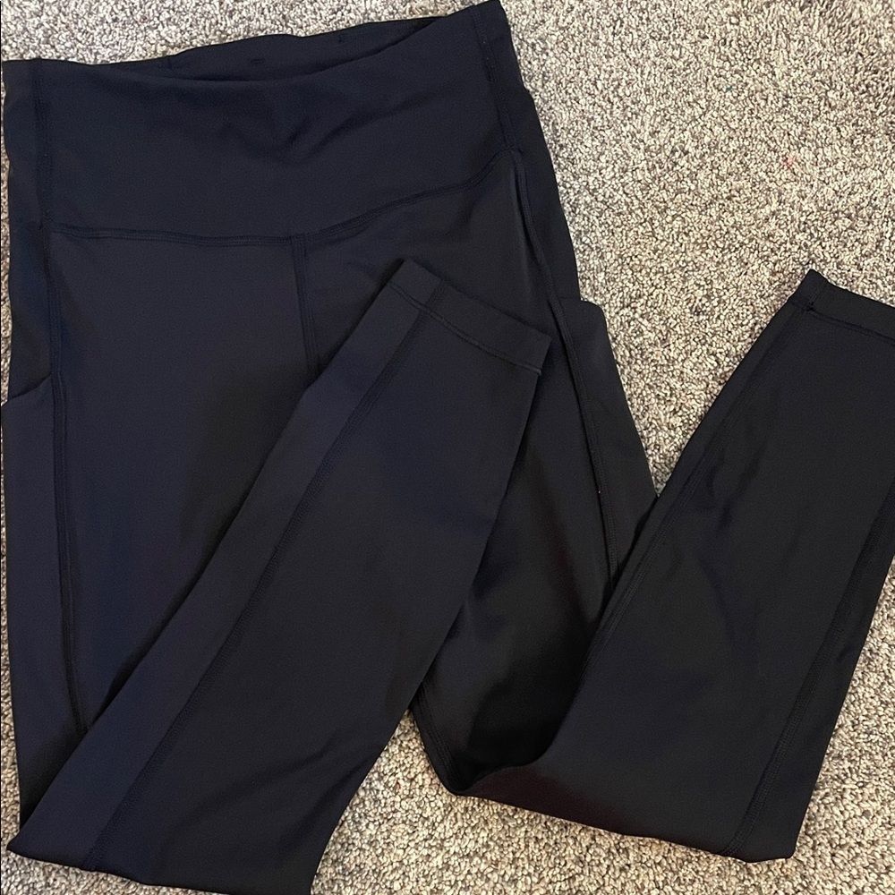 Athleta ultimate stash pocket 7/8 tight black legging XS